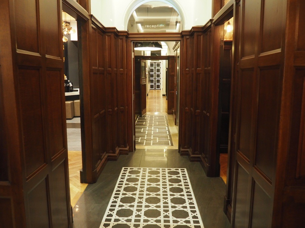 The hallway hints of the building's heritage